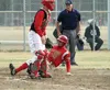 Wasilla senior Tyler Hansen slides into home during a win over Houston earlier this season. Hansen and the Warriors won their first conference title since 2001. Wasilla is also making its fir