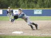 Alaska Road Warriors third baseman Ben Ross dives for a ball during Thursday’s game against the Service Cougars at McManus Field in Wasilla. ROBERT DeBERRY/Frontiersman
