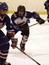 Palmer's Alex Senta pursues the puck in the third period of
Wednesday's game against North Pole at Brett Memorial Ice Arena.
Photo by TIM BRODT/Frontiersman.