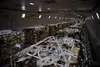 Pallets of ammunition, weapons and other equipment bound for Ukraine are secured onto a plane during a foreign military sales mission at Dover Air Force Base, Delaware, Feb. 28, 2022. Since 2