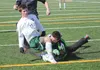 Colony’s Kyle Bolam collides with Soldotna goalkeeper Kayne North during the Knights’ win over the Stars Saturday at Colony High School. ROBERT DeBERRY/Frontiersman.com