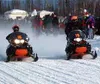 James Nunley, left, and Mark Nunley, right, take off from Big
Lake to begin their 2,000-mile journey to Fairbanks in the Iron Dog
2000 Sunday. Photo by TIM BRODT/Frontiersman.