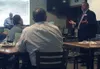 Michael Martin, right, executive vice president and general counsel for Northrim Bank, talks about banking and the state’s emerging marijuana industry at the weekly Wasilla Chamber of Commerc