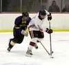 Houston's Isaac Smolden controls the puck during a 4-1 win over Copper River Friday at the Big Lake Recreation Center. Courtesy Bruce Eggleston/matsusports.net