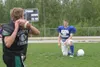 MATT TUNSETH/Frontiersman Colony quarterback Bradley Truax
prepares to throw to Palmer quarterback Conrad Smith Monday during
a drill at the All-Alaska Football Camp at Colony High. More than