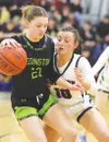 Redington's Kaydence Seymore tries to get past Houston's Tanea Cook during a win over the Hawks. Bruce Eggleston/matsusports.net
