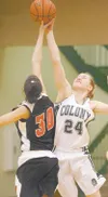 ROBERT DeBERRY/Frontiersman Colony senior Allie Grazilus goes up
against Kenai’s Lacie Wortham during Friday’s game at Colony High
School.