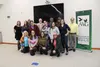 AWG members pose for a photo at the Wasilla Public Library Thursday, Sept. 15. Jacob Mann/Frontiersman