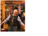 Howard Bess sings at his 90th birthday party.