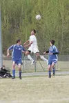 Colony’s Grant Krueger heads the ball during the second half of
Saturday’s third-place game against Palmer at the Northern Lights
Conference Championships at Colony High School. (ROBERT
DeBER
