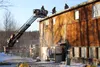 Dozens of on-call responder firefighters from the Butte Fire Department, Sutton Fire Department and Palmer Fire and Rescue descended upon the iconic green building on the Old Glenn Highway ne