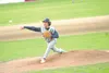 Alaska starting pitcher Chris Breck fires a throw toward the
plate during the Road Warriors’ 6-5 extra-inning loss to Dimond
during the BP Invitational at Mulcahy Stadium in Anchorage on
Satu