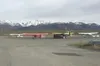 Planes sit idle at the Birchwood Airport on Wednesday, April 27, 2016. A plane that took off from the airport crashed on April 20, killing four people, including two employees of a Palmer sur