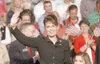 STEPHAN SAVOIA/Associated Press Alaska Gov. Sarah Palin waves to
supporters as she is introduced as vice presidential running mate
by presumptive Republican presidential nominee Sen. John McC
