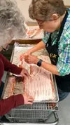 This year, the Palmer Lions Club prepared and served 45 pounds of bacon to over 250 guests, including a very hungry hockey team Courtesy Mary Jo Parks
