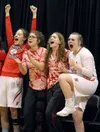 A group of Warriors cheer their teammates from the sideline during Wasilla's 46-38 victory over East Anchorage in the 4A girls semifinals Friday at the Alaska Airlines Center in Anchorage. Wa