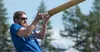 Billy Wayne Eldridge competes in the caber toss event at the Alaska Scottish Highland Games in Palmer on Saturday. J. David McChesney/Frontiersman