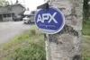 ROBERT DeBERRY/Frontiersman An APX Security sign attached to a
tree serves as a deterrent to would-be burglars. APX, which is now
Vivint Inc., is a Utah-based home security company that has b