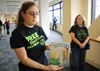 Christiane Joy Allison shows two children’s books she published to help kids with parents who are wrongly accused. Jacob Mann/Frontiersman