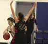 Redington's Abbie Fuller tries to get around the defender during a loss to Houston in December. The Huskies boys and girls basketball programs are in their first season of varsirty competitio
