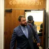 Track Palin, behind his attorney, Patrick Bergt, exit a courtroom at the Anchorage Veterans Court June 18, 2018, trying to avoid members of the media. Jacob Mann/Frontiersman