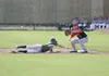 Mat-Su catcher J.J. Hancock slides back into first safely as Peninsula infielder Bennett Oliver waits for the throw during Mat-Su's 17-1 win over the Oilers July 15 at Hermon Brothers Field i