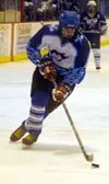 Palmer freshman Spencer Galvin skates the puck down the ice
midway through Palmer's 6-1 loss to Soldotna on Friday at the Brett
Memorial Ice Arena. Photo by JEREMIAH BARTZ/ Frontiersman.
