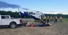 Members of Suppression Module Denali load their gear into a helicopter Sunday evening, June 23. 2024, to be shuttle to the Susitna Fire (#235). The lightning caused fire was burning along the