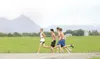 ROBERT DeBERRY/Froniersman Members of the Palmer cross country
running team pound the pavement along Scott Road Monday afternoon
in Palmer.