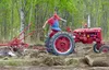 Dick Sloan puts his Farmall through its paces on Plow Day May 19. Barbara Hunt/For the Frontiersman