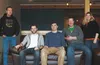 Sustainable Design Group employees sit proudly in The Annex, the new collaborative workspace available for up to 40 small business employees looking for office space and one-of-a-kind network