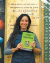 Wasilla High teacher Jenny Barnes holds the CS50 manual before she begins class. CS50 is a new computer science class offered at Colony and Wasilla high schools. Ms. Barnes teaches alongside 