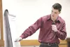 ROBERT DeBERRY/Frontiersman Clay Hein, 20, of Wasilla,faces
attempted murder and assault charges for firing a gun at a Chevy
Malibu as it exited the commuter parking lot on Trunk Road last
ye