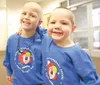 ROBERT DeBERRY/Frontiersman Rhys Allen, left and Connor Dunham,
both 4, stand together as friends and cancer survivors at Friday’s
Leukemia and Lymphoma Society Light the Night Walk in Wasill