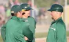 Mat-Su Miners pitching coach Matt Greely, head coach Ben Taylor and assistant coach Sean Winston talk during a break in the action. JEREMIAH BARTZ/Frontiersman