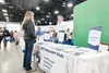 Dave Hoffman sells materials for Brigham Young University, a private religious college, at the IDEA Homeschool Curriculum Fair in Anchorage on April 18, 2024.  Claire Stremple/Alaska Beacon