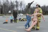 Airman 1st Class Jason Fager, 673d Civil Engineer Squadron firefighter, carries a mannequin to the end of the obstacle during the inaugural Fire Muster, Oct. 10, 2017, on Joint Base Elmendorf