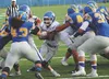 Palmer tailback Larry Cutsforth is stopped short of the goal line in the second quarter of Friday night's game at Bartlett High School in Anchorage. (MATT HICKMAN/Frontiersman)