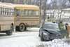 A vehicle sits in the ditch off Grumman Circle after a head-on
collision with a First Student school bus in this Frontiersman file
photo. There have already been several accidents involving s