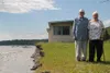 Ed and val Musial, both in their 90s, have no plans to leave the home they've occupied since 1952. The Musials are watching as the Matanuska River laps at the block foundation of their Sutton