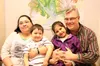 Barbara and Mike Swanson smile for a photo with their children, Joseph (3) and Isabella (6) at the Frontiersman office on Saturday, Dec. 19. The family of five (13-year-old Shannah is not pic
