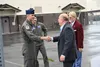 The Hon. Ronald T. Keohane, right, assistant secretary of defense for manpower and reserve affairs, greets U.S. Air Force Capt. Chas Ballard, left, an F-22 Raptor pilot assigned to the 525th 