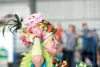 Cabbage Fairy Audrey Kelly warms up the crowd before the start
of the 2010 Giant Cabbage Weigh-Off at the Alaska State Fair Friday
evening. (ROBERT DeBERRY/Frontiersman)