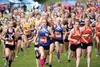 Palmer junior Ruby Woodings leads a pack at the beginning of the 4A varsity girls race during the Palmer Invitational Sept. 5 at Palmer High School. JEREMIAH BARTZ/Frontiersman