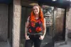 Sarah Oates, president of the Alaska Cabaret, Hotel, Restaurant and Retailers Association, stands outside the organization’s Midtown Anchorage office on Oct. 7, 2024. CHARR is one of the busi
