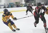 Homer’s Isaiah Nevak covers Houston’s Isaiah Rasnake-Squires while he takes the puck into Mariner territory during a Thursday, Nov. 14, 2019 game of the End of the Road Shootout at Kevin Bell