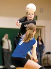Palmer senior Lily Cullers keeps the ball in play as Palmer’s Mariah McNamara backs her up during Palmer’s win over the Colony Knights in the regular season. Palmer, the three-time defending 