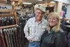 CW Tack and Western Wear owners Charlie and Nancy Willis stand inside their Wasilla Western wear store. ROBERT DeBERRY/Frontiersman.com
