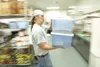 Robert DeBERRY/Frontiersman Rick Dalmolin, director of food
services for the Wasilla Senior Center, sets a fast pace during the
morning food preparation. A kitchen crew of senior center emplo