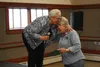 Palmer Mayor Edna DeVries hugs Denise Statz as she accepts the Citizen of the Year Award. Jacob Mann/Frontiersman